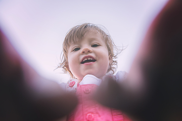 Image showing little girl spending time at backyard