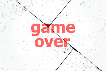 Image showing Text Game over. Web design concept . Closeup of rough textured grunge background