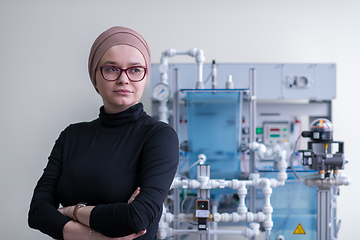 Image showing portrait of muslim female student in the electronic classroom