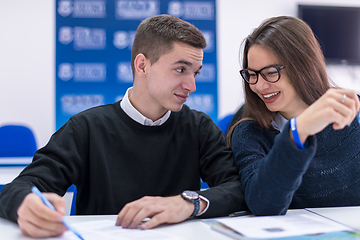 Image showing young students writing notes