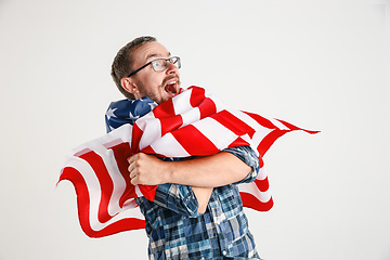 Image showing Young man with the flag of United States of America