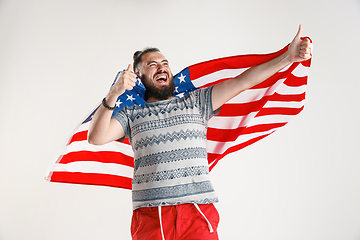 Image showing Young man with the flag of United States of America