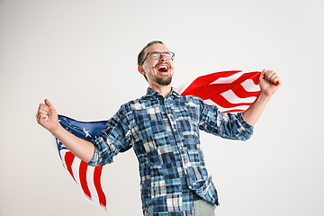 Image showing Young man with the flag of United States of America