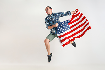 Image showing Young man with the flag of United States of America