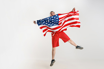 Image showing Young man with the flag of United States of America