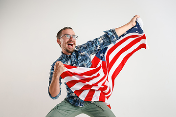 Image showing Young man with the flag of United States of America