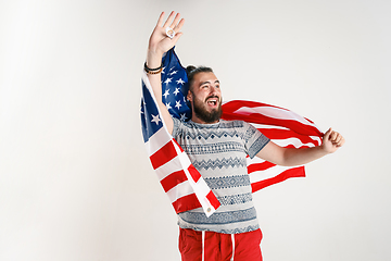 Image showing Young man with the flag of United States of America