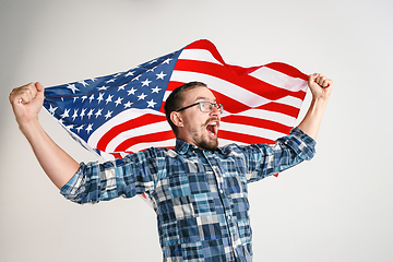 Image showing Young man with the flag of United States of America