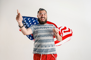 Image showing Young man with the flag of United States of America