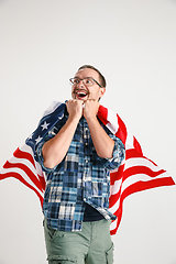 Image showing Young man with the flag of United States of America