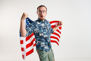 Image showing Young man with the flag of United States of America