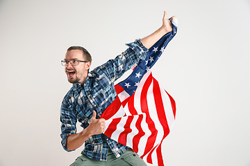 Image showing Young man with the flag of United States of America