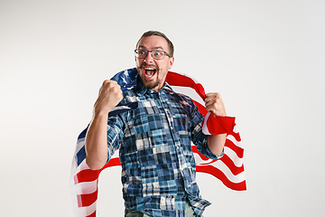 Image showing Young man with the flag of United States of America