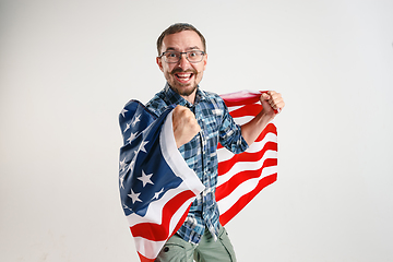 Image showing Young man with the flag of United States of America