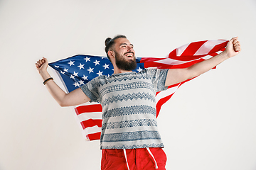 Image showing Young man with the flag of United States of America