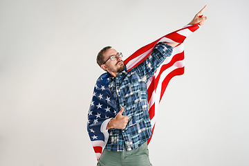 Image showing Young man with the flag of United States of America