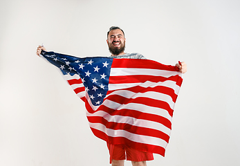 Image showing Young man with the flag of United States of America