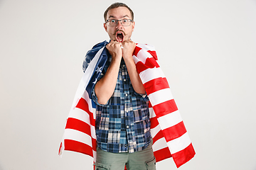 Image showing Young man with the flag of United States of America