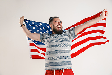 Image showing Young man with the flag of United States of America