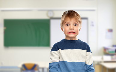 Image showing shocked little boy at school