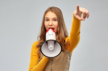 Image showing teenage girl speaking to megaphone