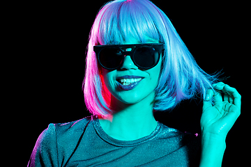 Image showing happy woman in pink wig and black sunglasses