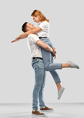 Image showing happy couple in white t-shirts