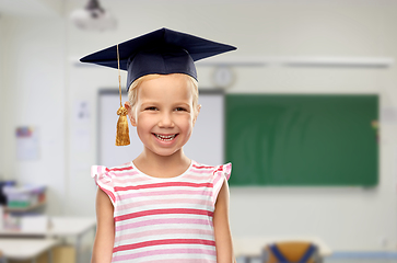 Image showing happy girl in bachelor hat or mortarboard