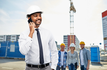 Image showing architect calls on smartphone at construction site