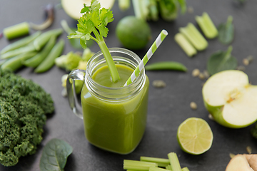 Image showing close up of glass mug with green vegetable juice