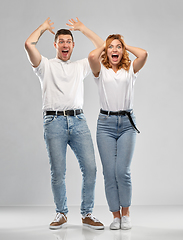 Image showing portrait of happy couple in white t-shirts