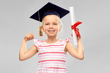 Image showing little girl in mortarboard with diploma