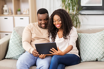 Image showing african american couple with tablet pc at home