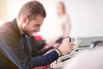 Image showing students doing practice in the electronic classroom