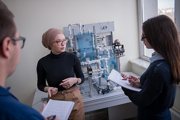 Image showing young students doing practice in the electronic classroom