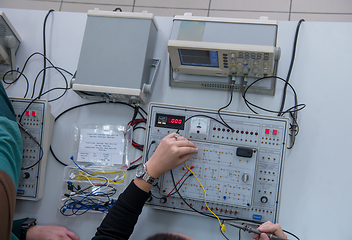 Image showing students doing practice in the electronic classroom top view