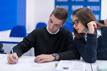 Image showing young students writing notes