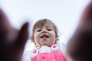 Image showing little girl spending time at backyard