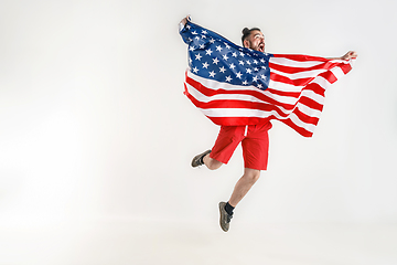 Image showing Young man with the flag of United States of America