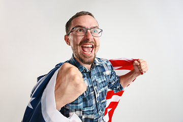 Image showing Young man with the flag of United States of America