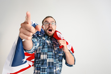 Image showing Young man with the flag of United States of America