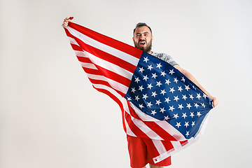 Image showing Young man with the flag of United States of America