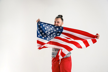 Image showing Young man with the flag of United States of America