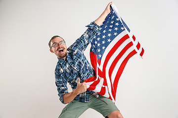 Image showing Young man with the flag of United States of America