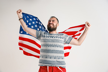 Image showing Young man with the flag of United States of America