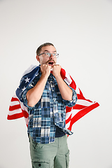 Image showing Young man with the flag of United States of America