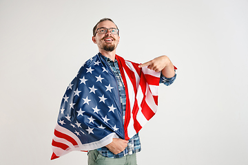 Image showing Young man with the flag of United States of America