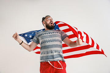 Image showing Young man with the flag of United States of America