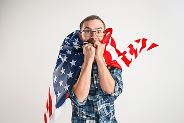 Image showing Young man with the flag of United States of America