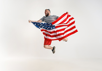 Image showing Young man with the flag of United States of America